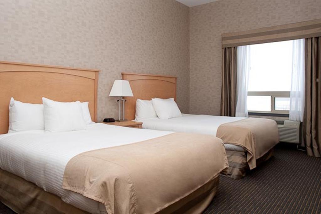 Paradise Inn And Suites Valleyview Номер фото